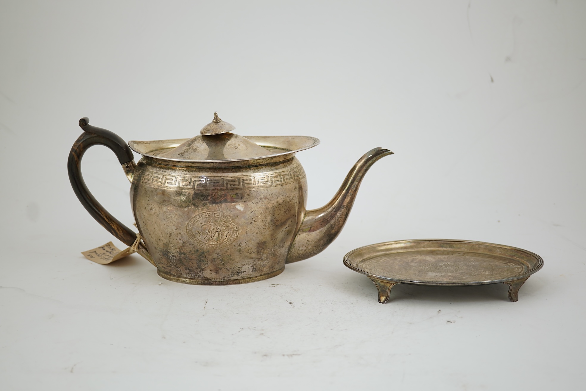 A George III silver oval teapot and matching oval stand, by John Eames